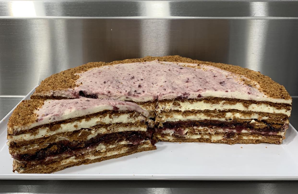 Sour Cherry Honey Cake showing its handmade layers