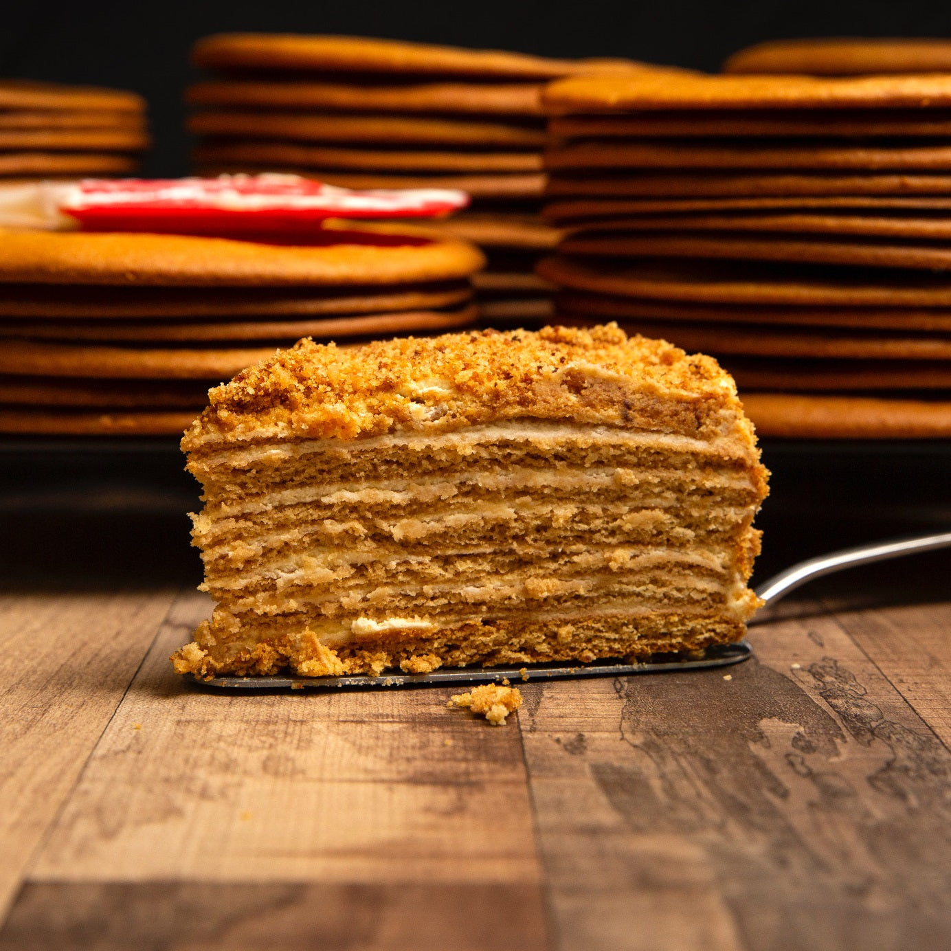 A slice of Sweettisserie layered honey cake